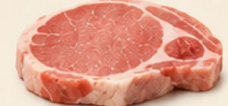 Good pork — pale pink pork chop with firm texture